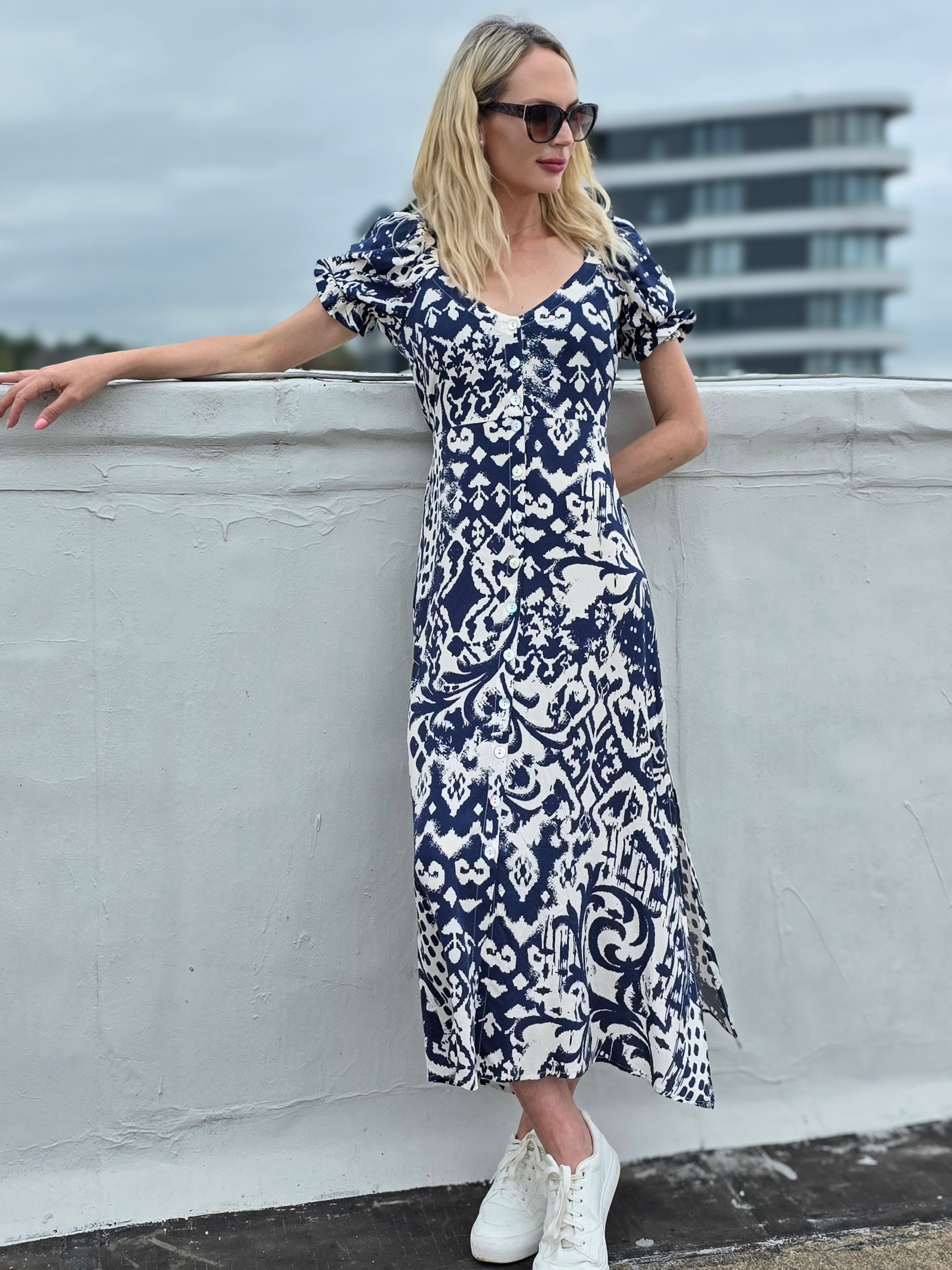 Dom - Sacred Jungle: Midi dress with belt and puff sleeves