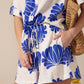 Sammy Shorts - Oasis Blue linen: High-waisted flared shorts with pockets