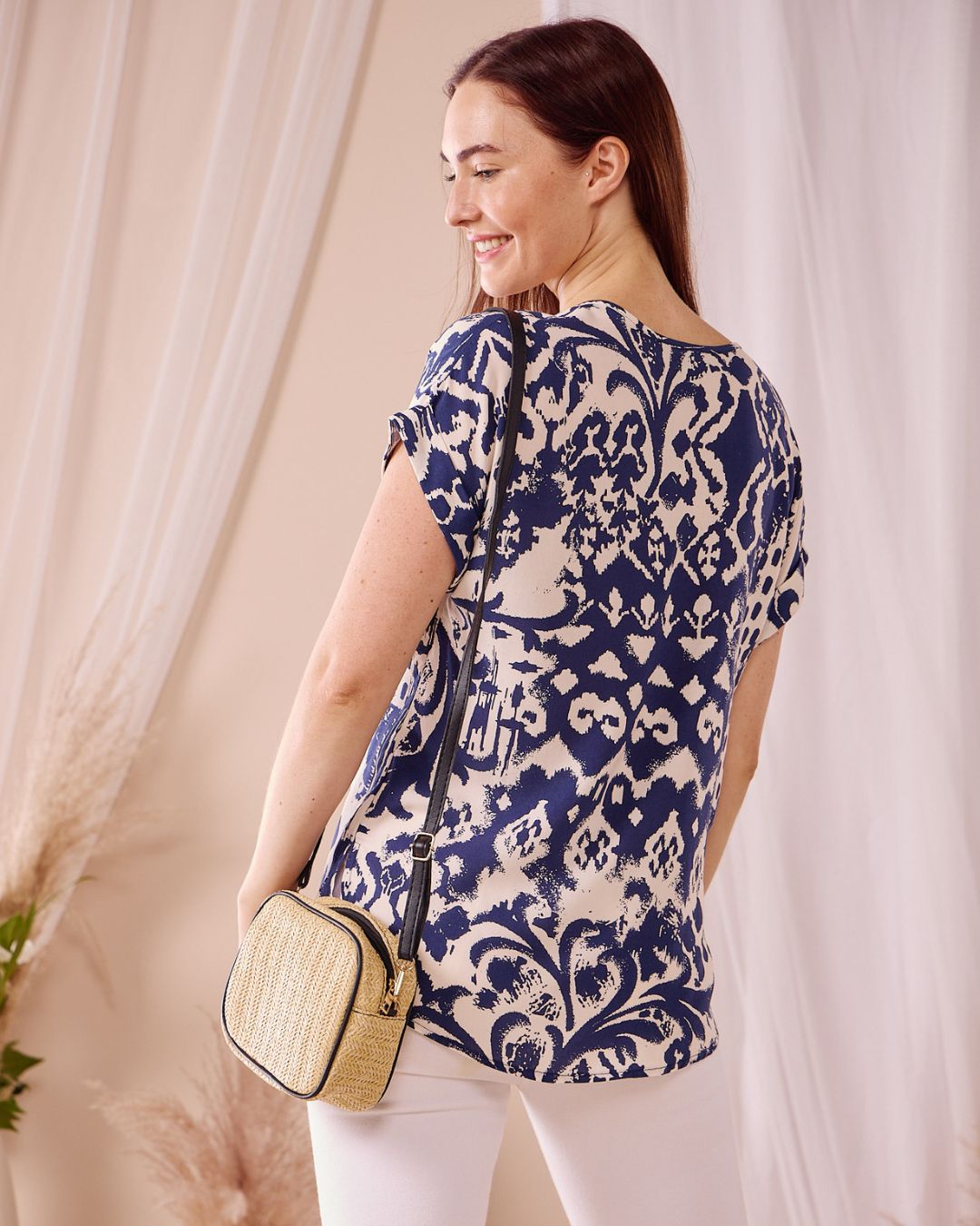 Faye - Sacred Jungle: V-neck top with binding detail