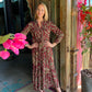 Winter Rose - Country Charm:  V-neck mandarin collar tiered dress with elasticated long sleeve