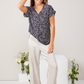 Faye - Meander: V-neck top with binding detail